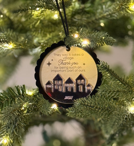 It takes a village ornament